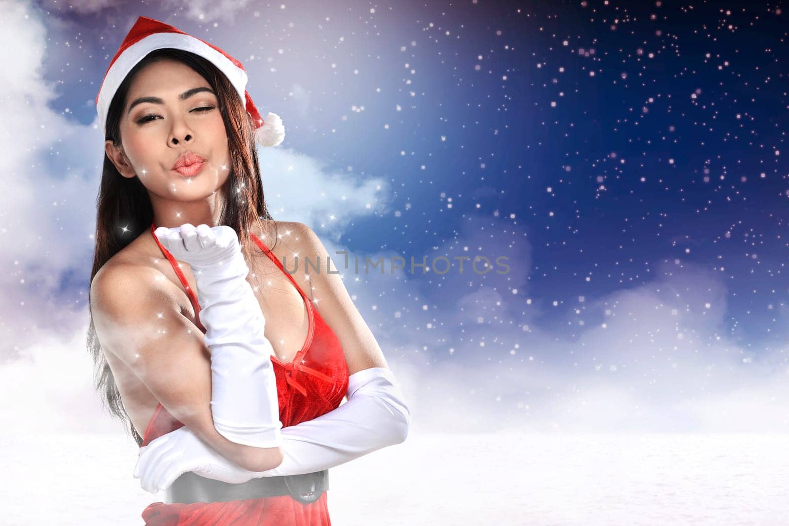 Beautiful smiling christmas santa woman wearing santa claus costume