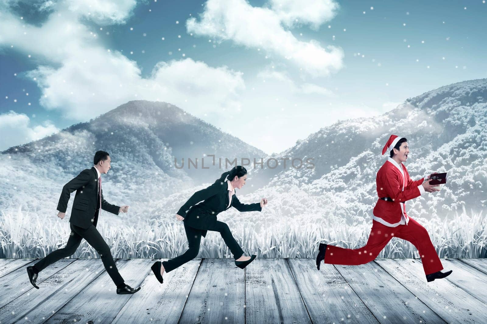 Business people chasing santa claus. Christmas bonus concept