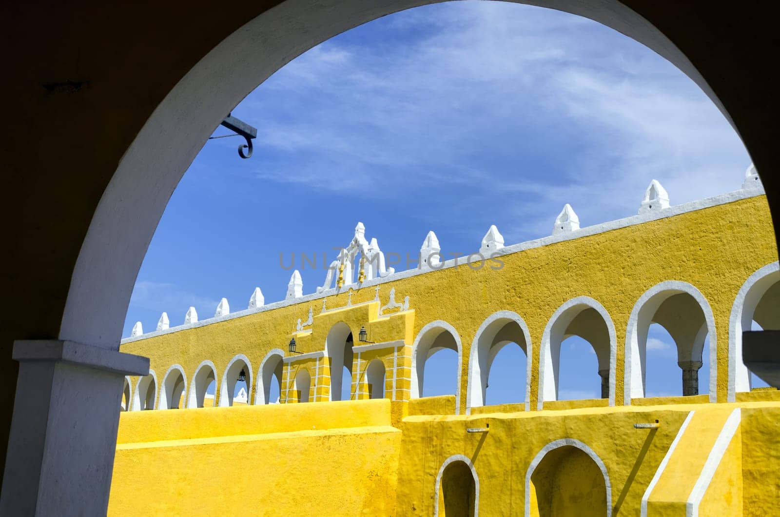 View of the entrance with arches of the monastery in Izamal, Mexico