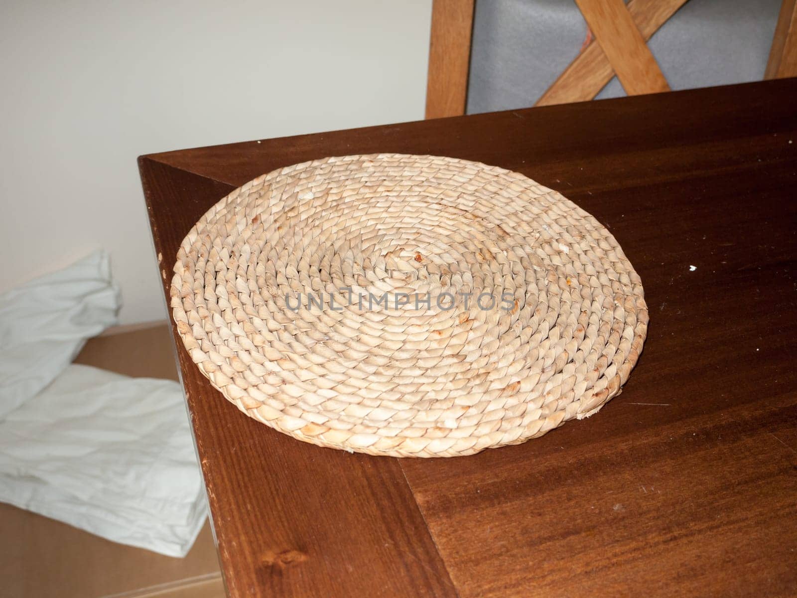 a circle spiral straw table top mat  England  UK