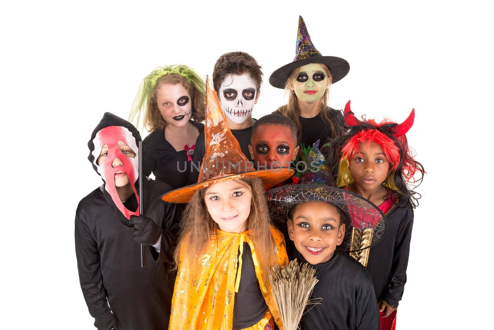Kids with face-paint and Halloween costumes isolated in white