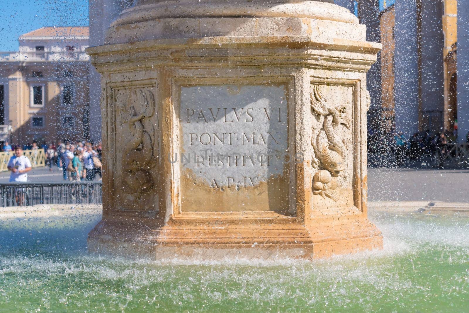 fountain at the famous st peter's square in vatican city