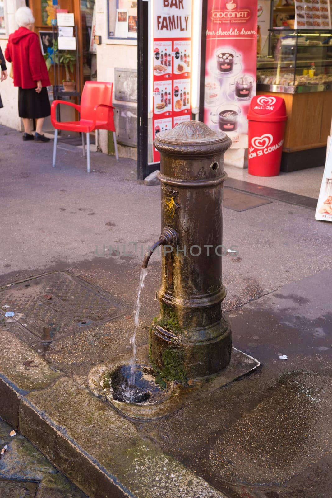 ROME, ITALY - OCTOBER 16, 2016: Old tap with drinking water in the city center