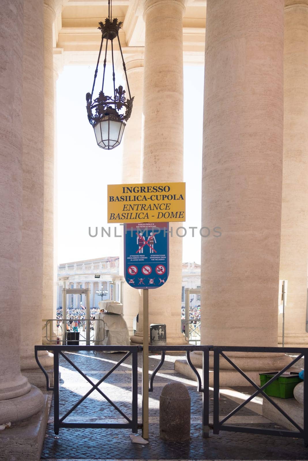 VATICAN CITY, VATICAN - OCTOBER 16, 2016: information shield in front of the piazza san pietro with the famous basilica st. peter