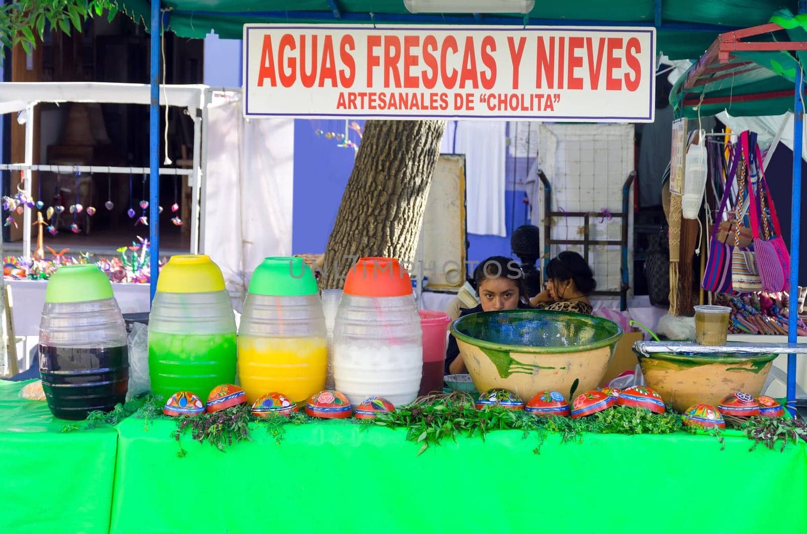 OAXACA, MEXICO - MARCH 4: Girl selling juice on the street in Oaxaca, Mexico on March 4, 2017