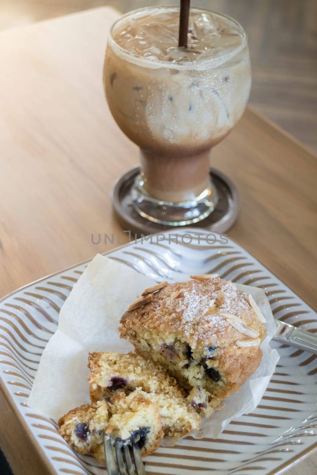 Blueberry muffin and iced coffee mocha, stock photo