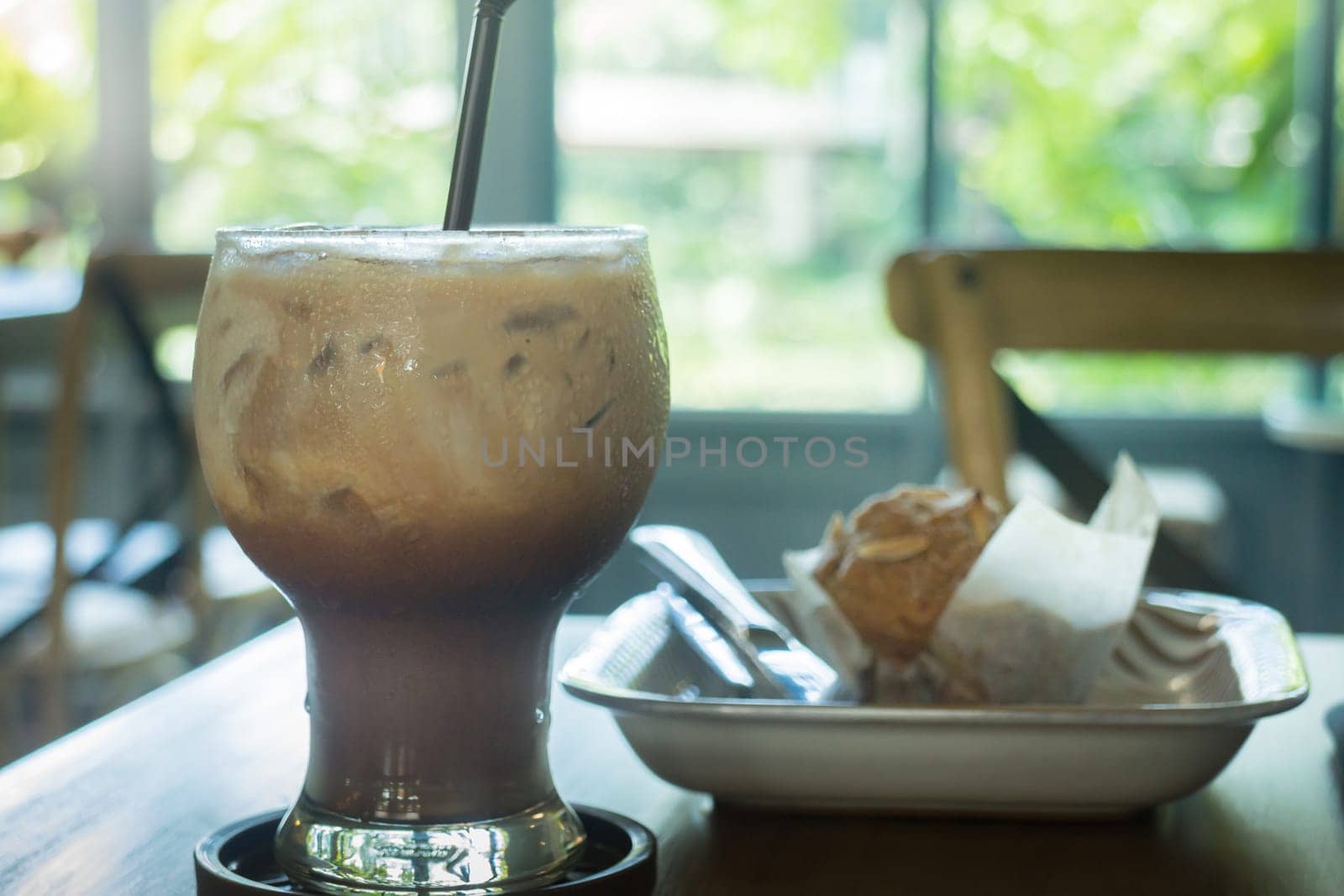 Blueberry muffin and iced coffee mocha, stock photo