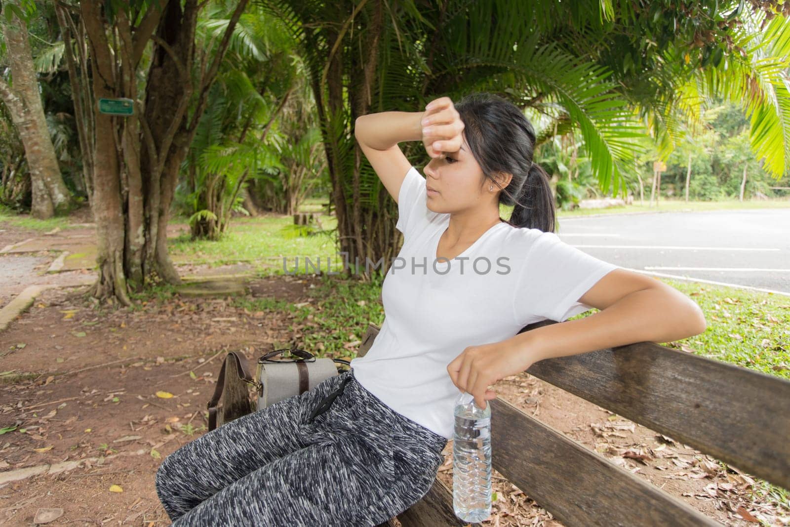 Beautiful smiling young asian woman enjoying yoga, relaxing, feeling alive, breathing fresh air, got freedom from work