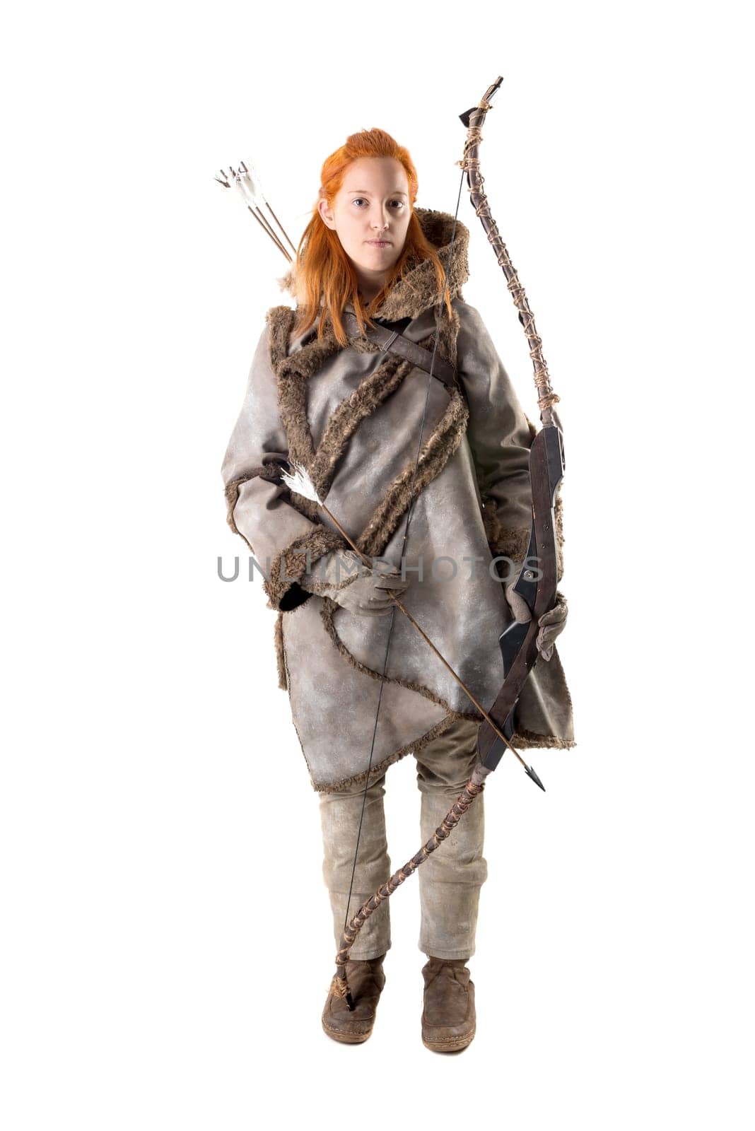 girl archer in a costume with bow isolated in white
