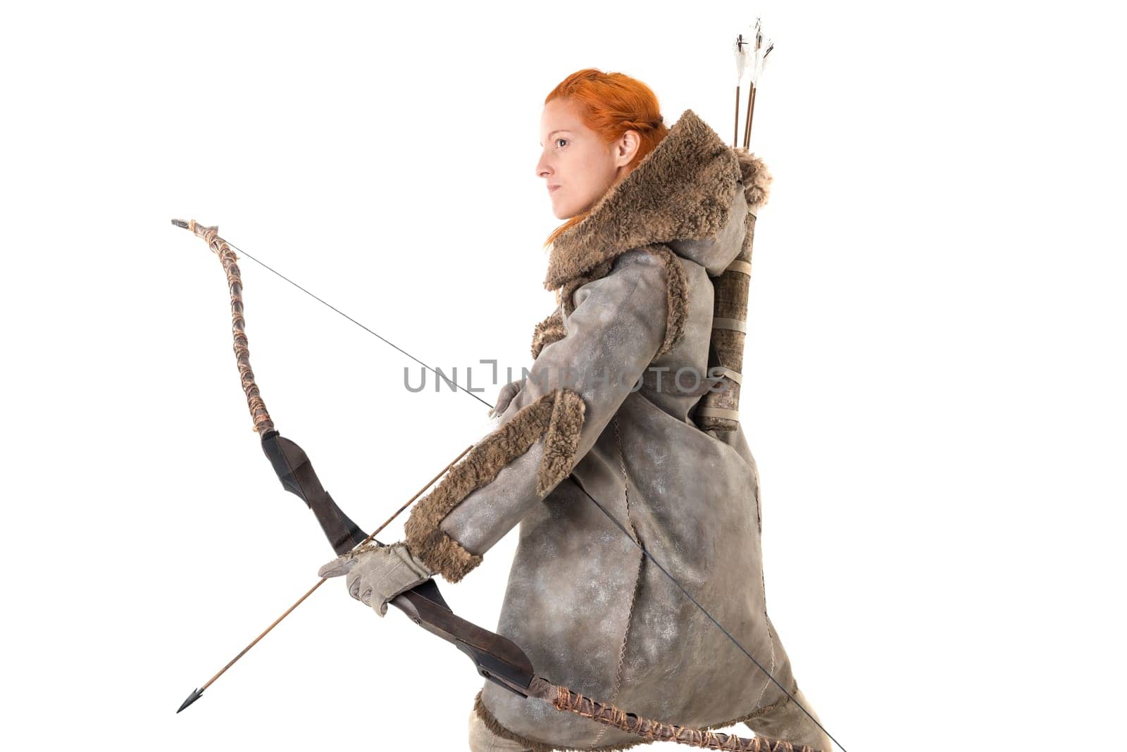 girl archer in a costume with bow isolated in white