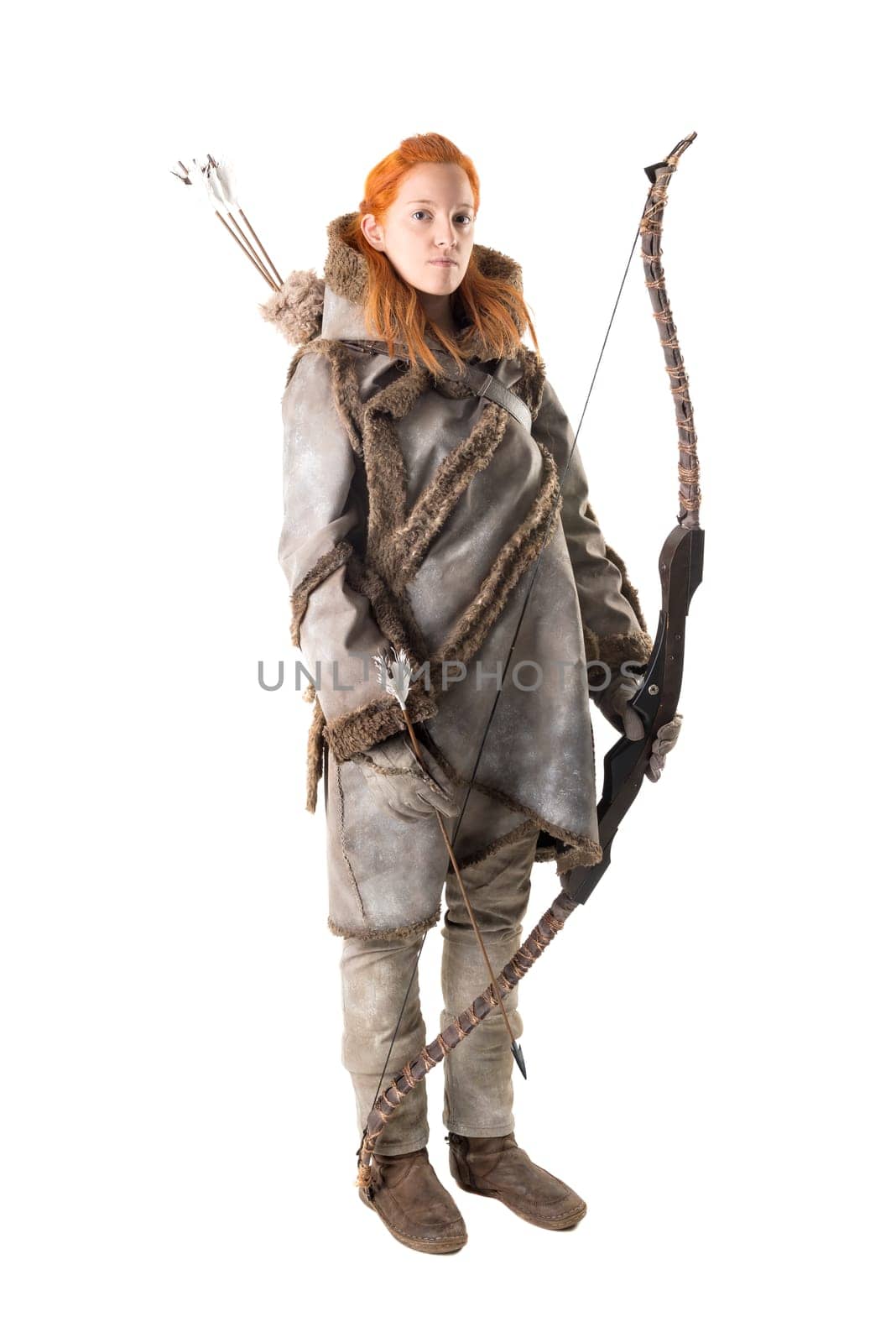 girl archer in a costume with bow isolated in white