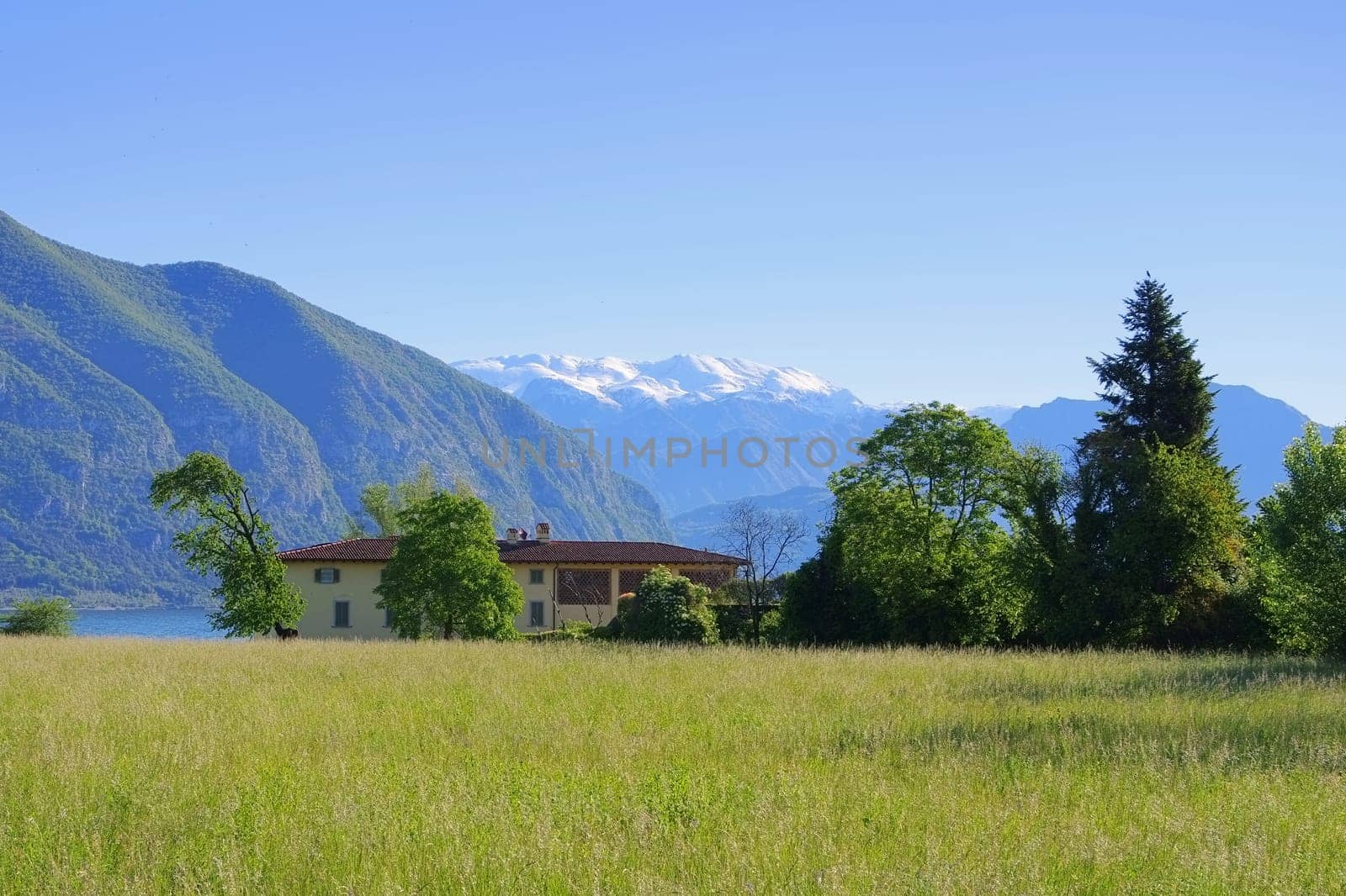 Lake Iseo with house - Iseo lake and small house,Lombardy in Italy