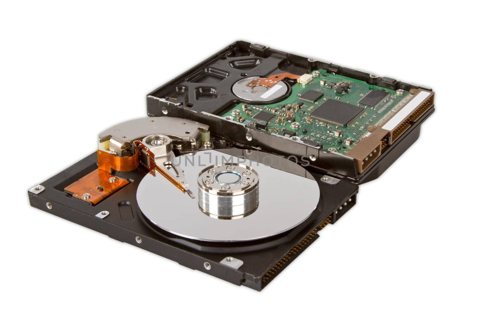 The inside of a hard disk drive on a light background