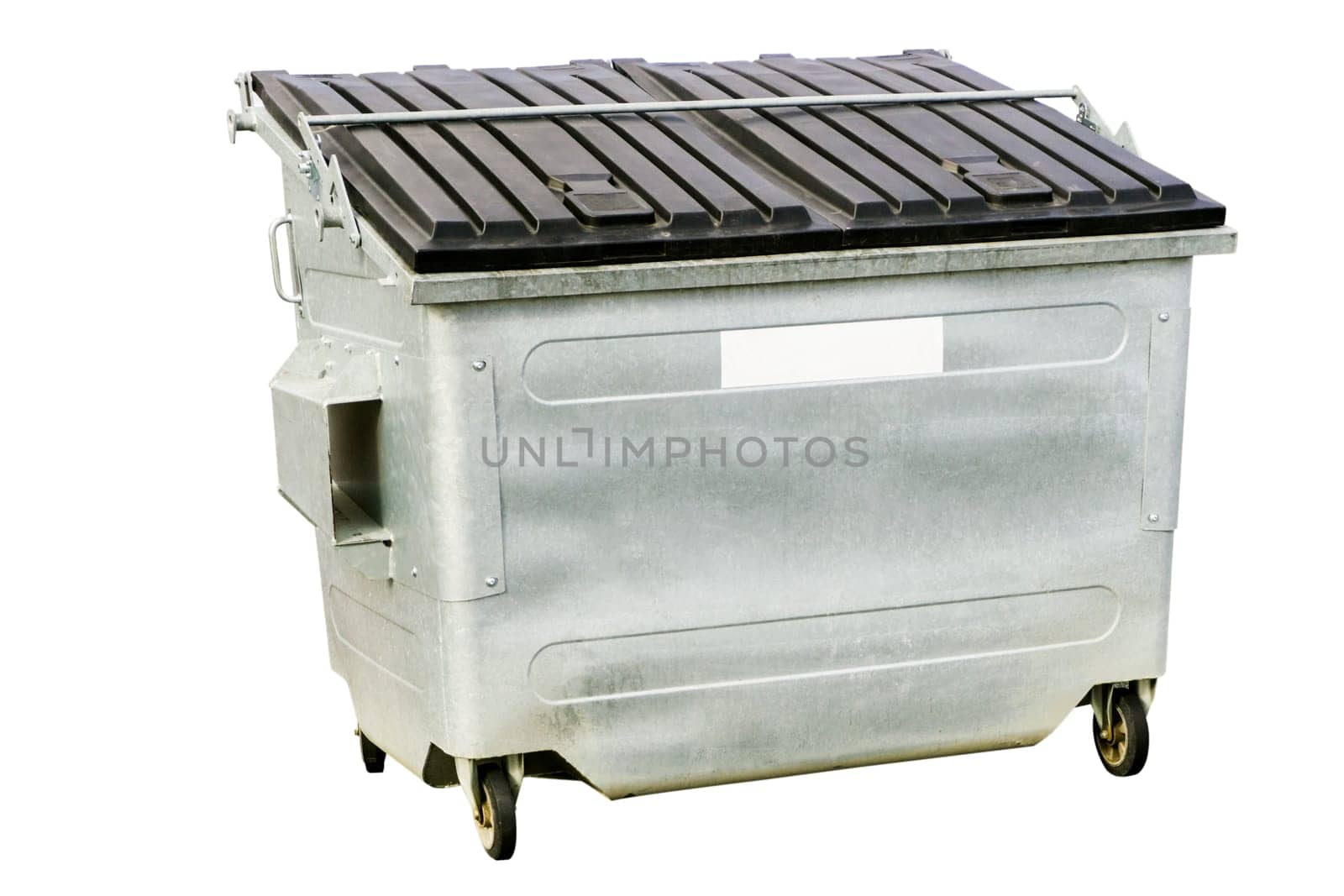 Large metal dumpster exposed on a white background