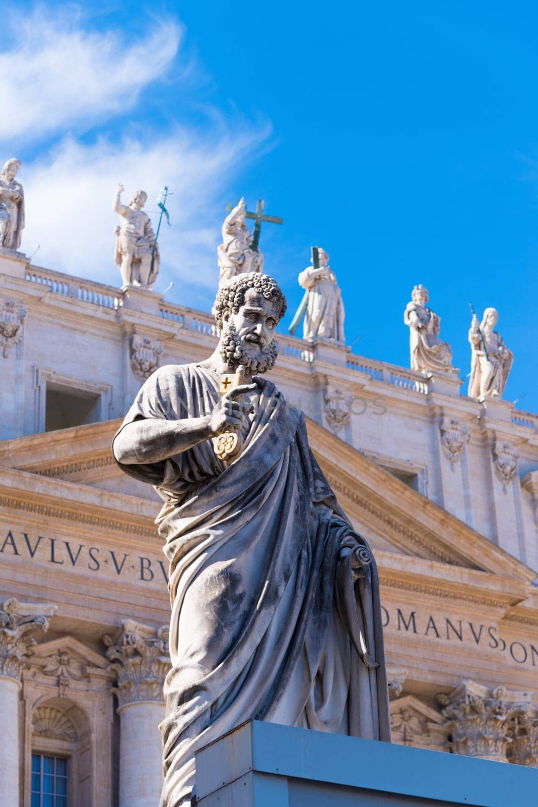 VATICAN CITY, VATICAN - OCTOBER 16, 2016: Statue Saint Peter in front of St Peter's Basilica on piazza San Pietro