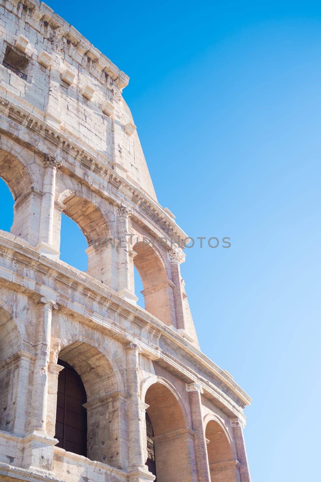 detail of the famous collosseum amphitheater in rome, italy