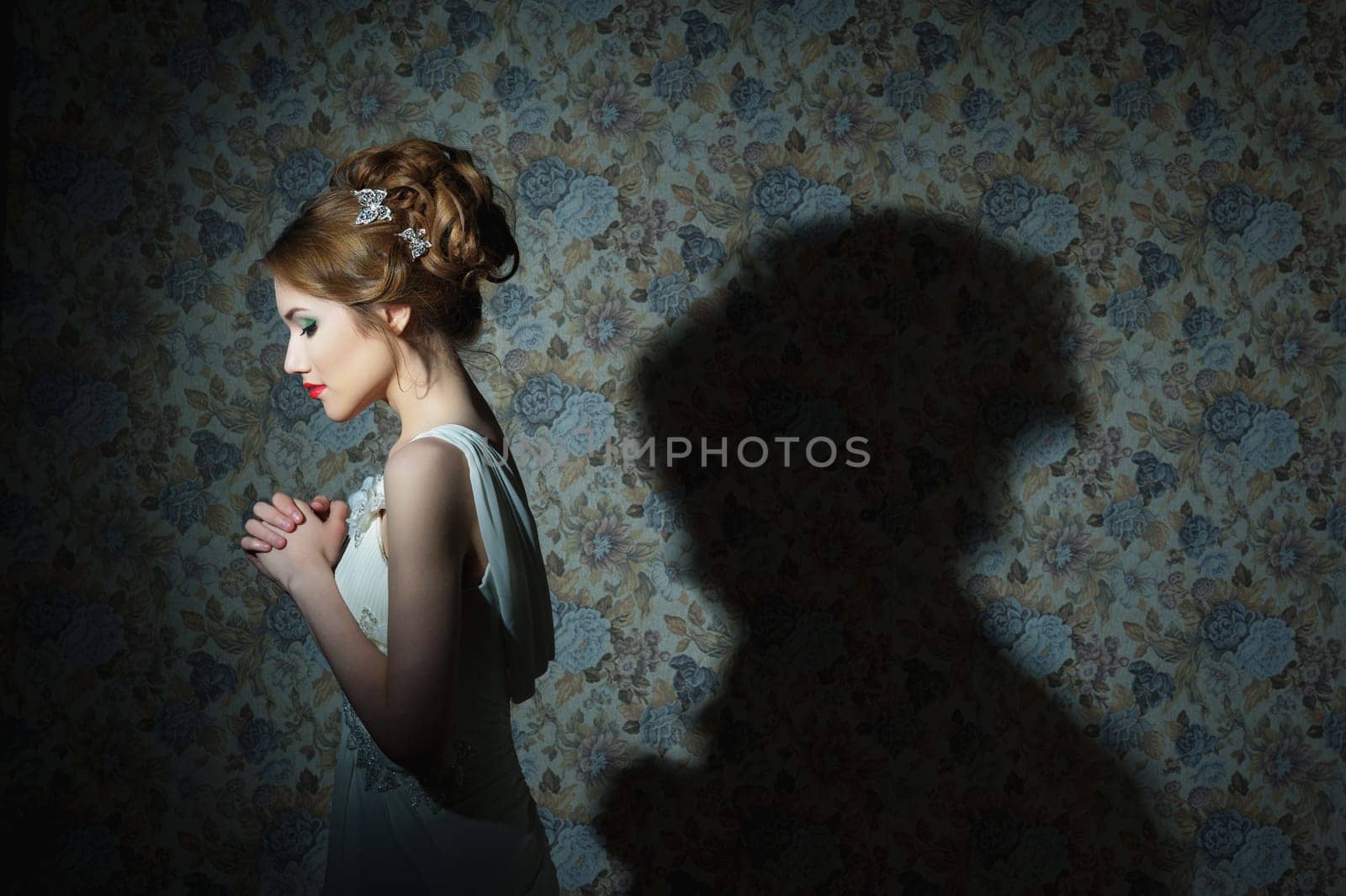 Portrait of young beautiful girl with wavy hair. Fashion photo