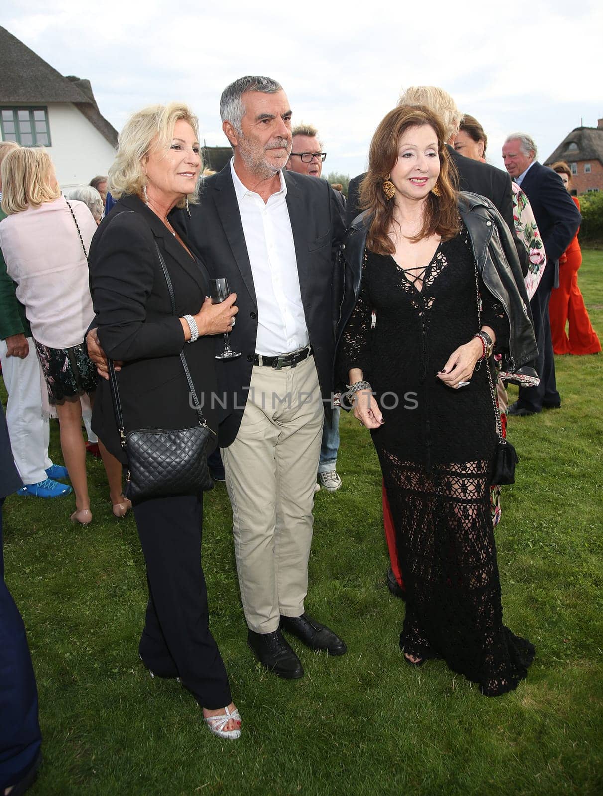 Sabine Christiansen with husband Norbert Medus and Vicky Leandros ,. Manfred Baumann invited to the yearly crab dinner in his house in Morsum - Sylt