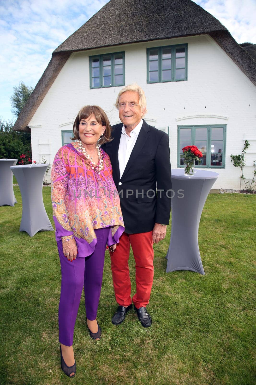 Manfred Baumann and Katharina Baumann invited to an honorary crab dinner in his house in Morsum - Sylt