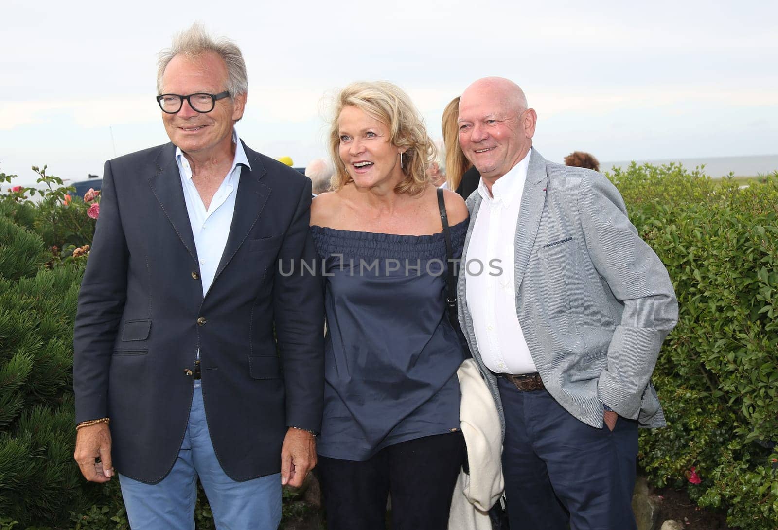 Wolf-Peter Schneider ,Katrin Aust ,Joachim Hunold,. Manfred Baumann invited to the yearly crab dinner in his house in Morsum - Sylt