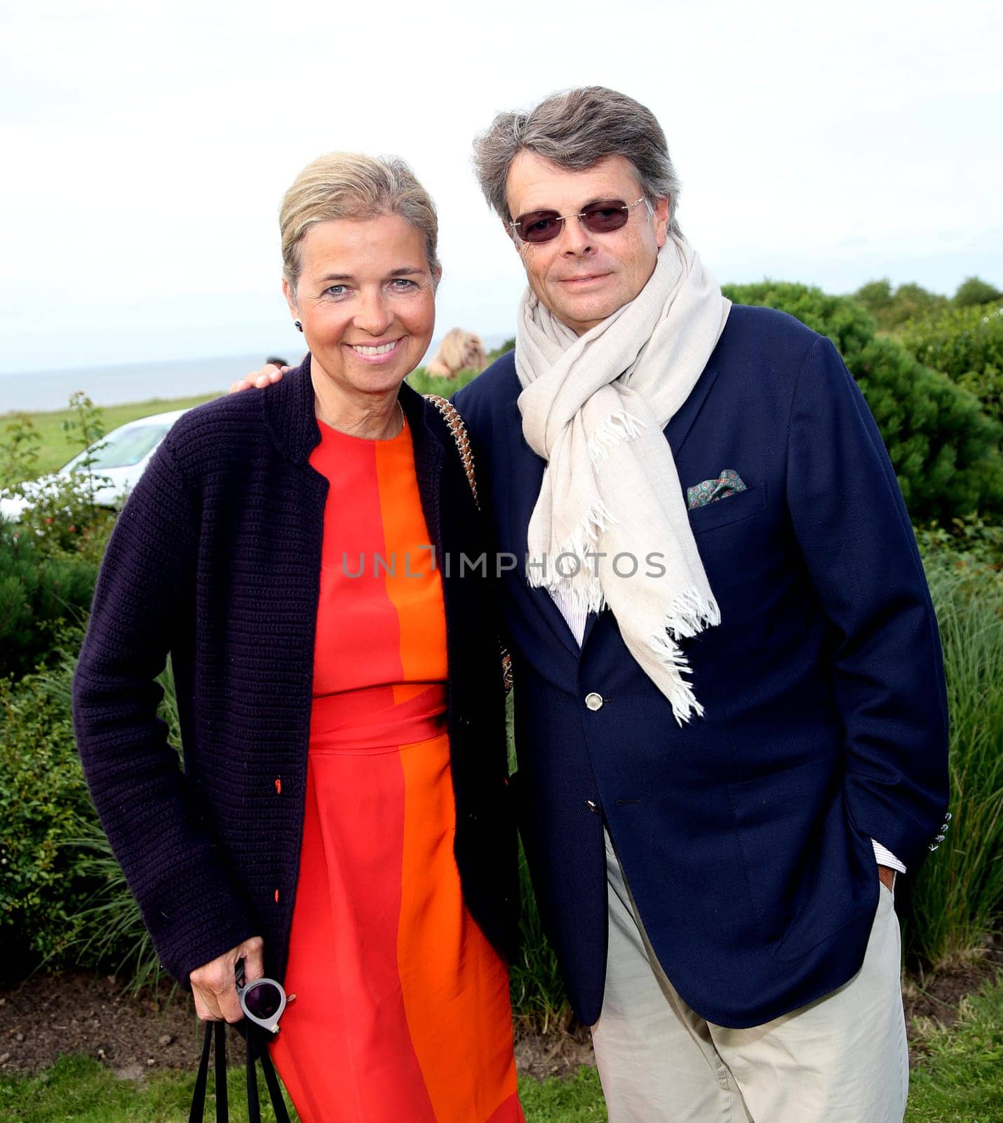 Inga Griese with man . Manfred Baumann invited to the yearly crab dinner in his house in Morsum - Sylt