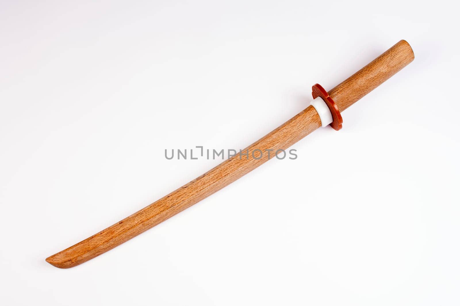 Japanese wooden short sword for training isolated on white background.