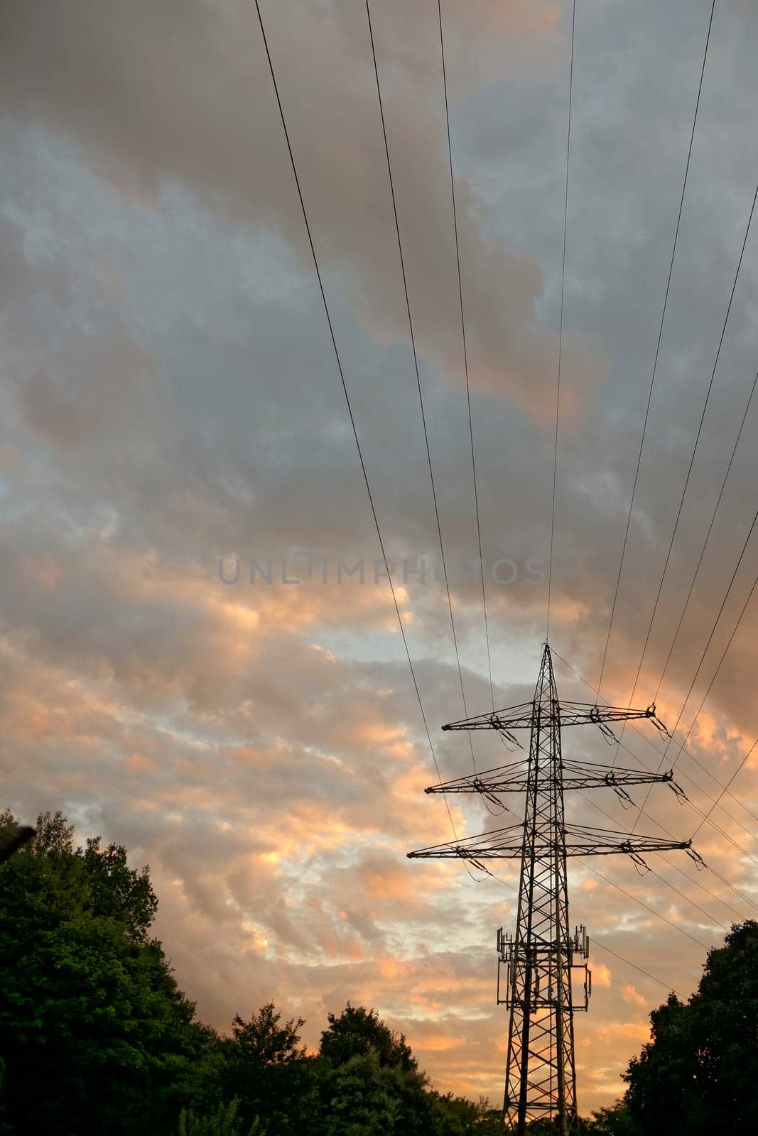 Overhead line mast with base tower