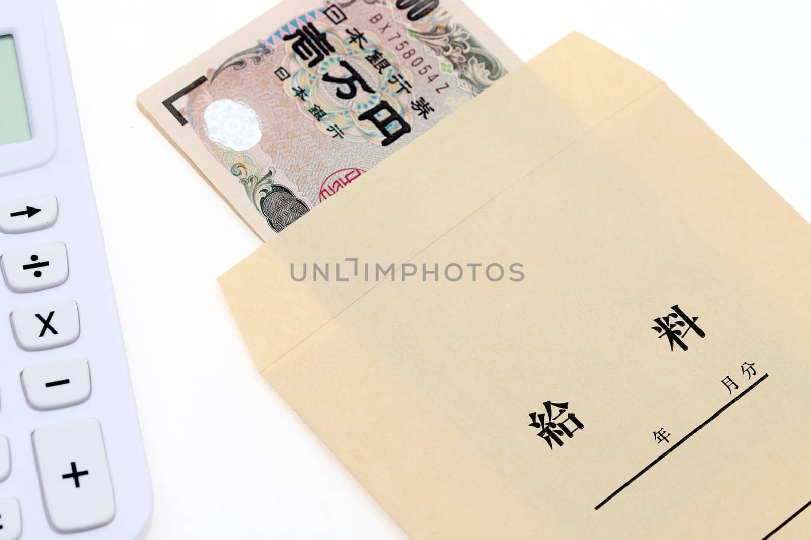 Japanese money in salary envelope on white background　