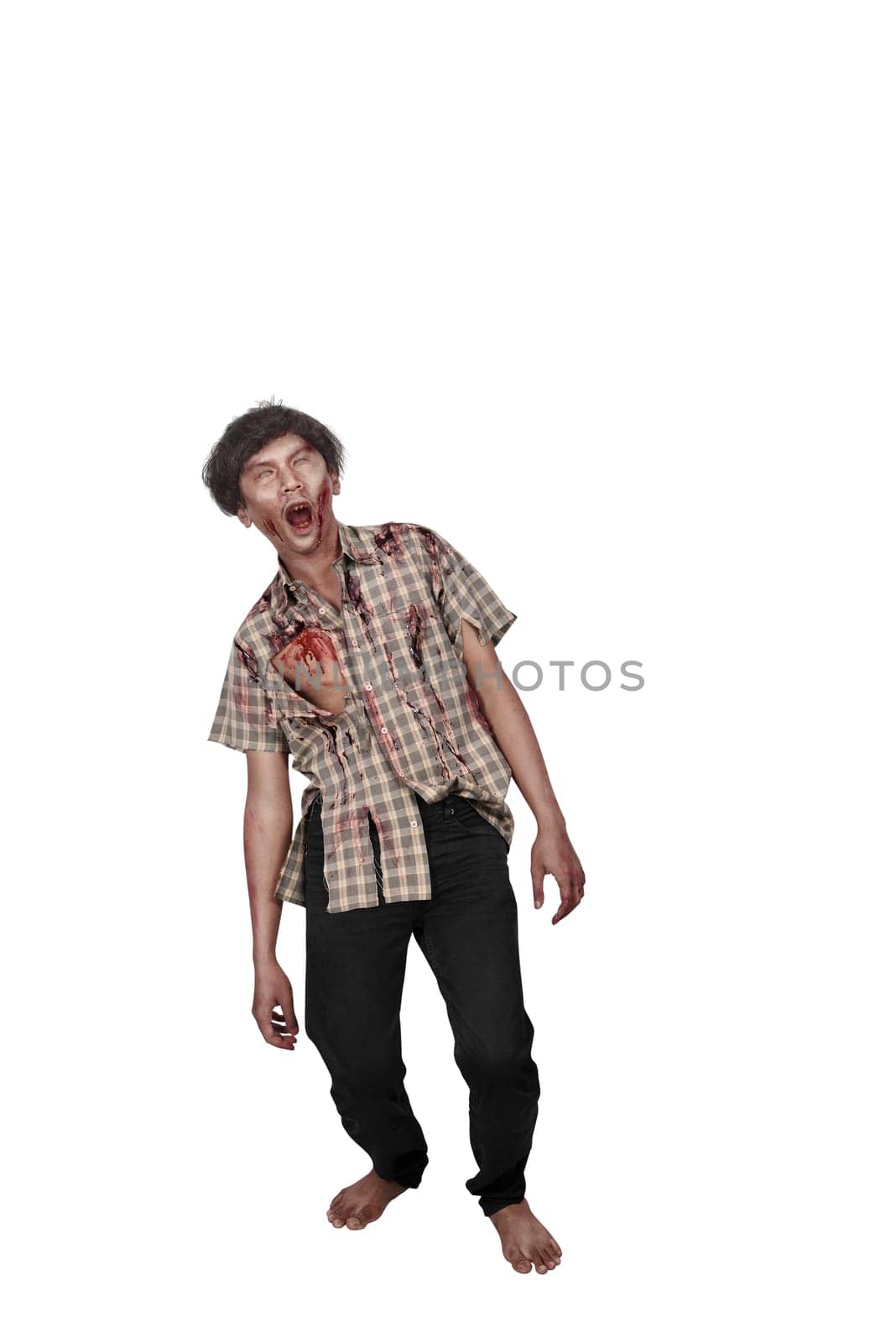 Portrait of asian zombie man with blood standing isolated over white background