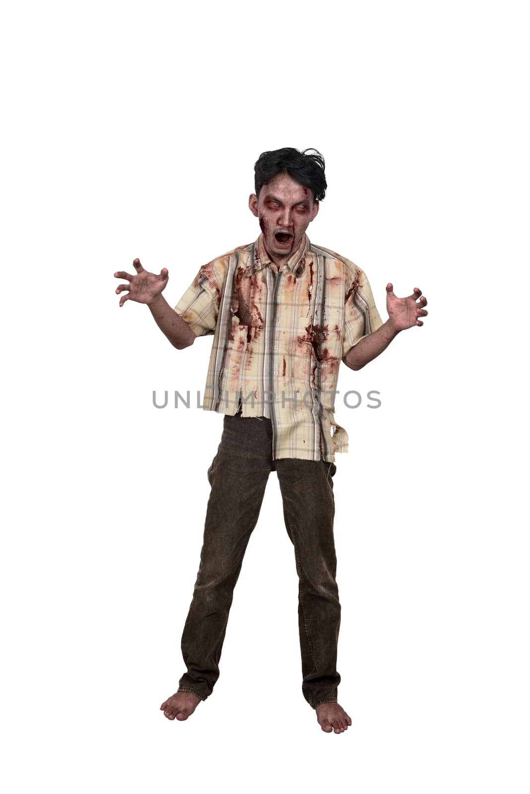 Portrait of asian zombie man with blood standing isolated over white background