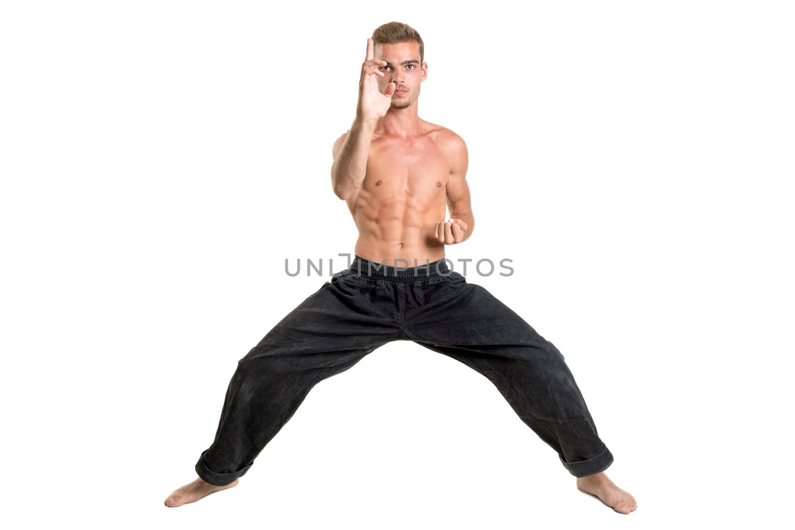 Martial arts student isolated in a white background