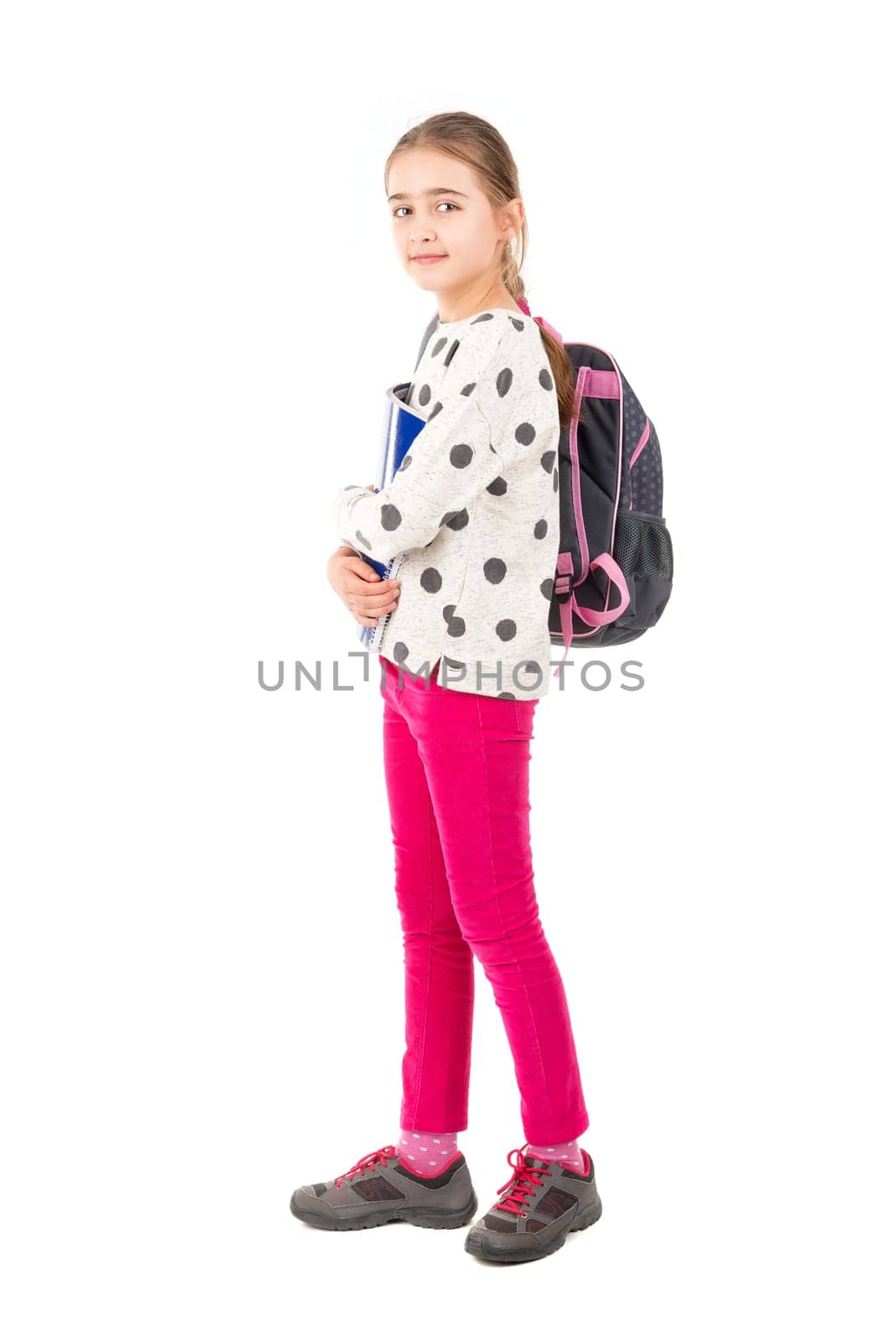Young girl student posing isolated in white