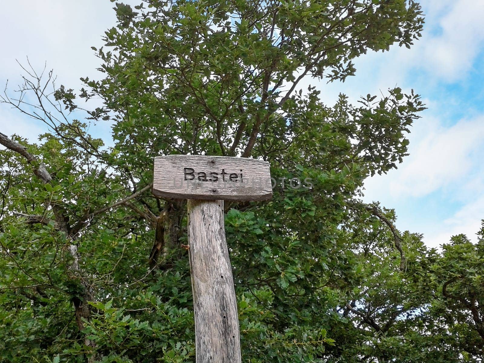 Signpost labeled with "Bastei"", a overlook near city Bad Kreuznach, Germany"