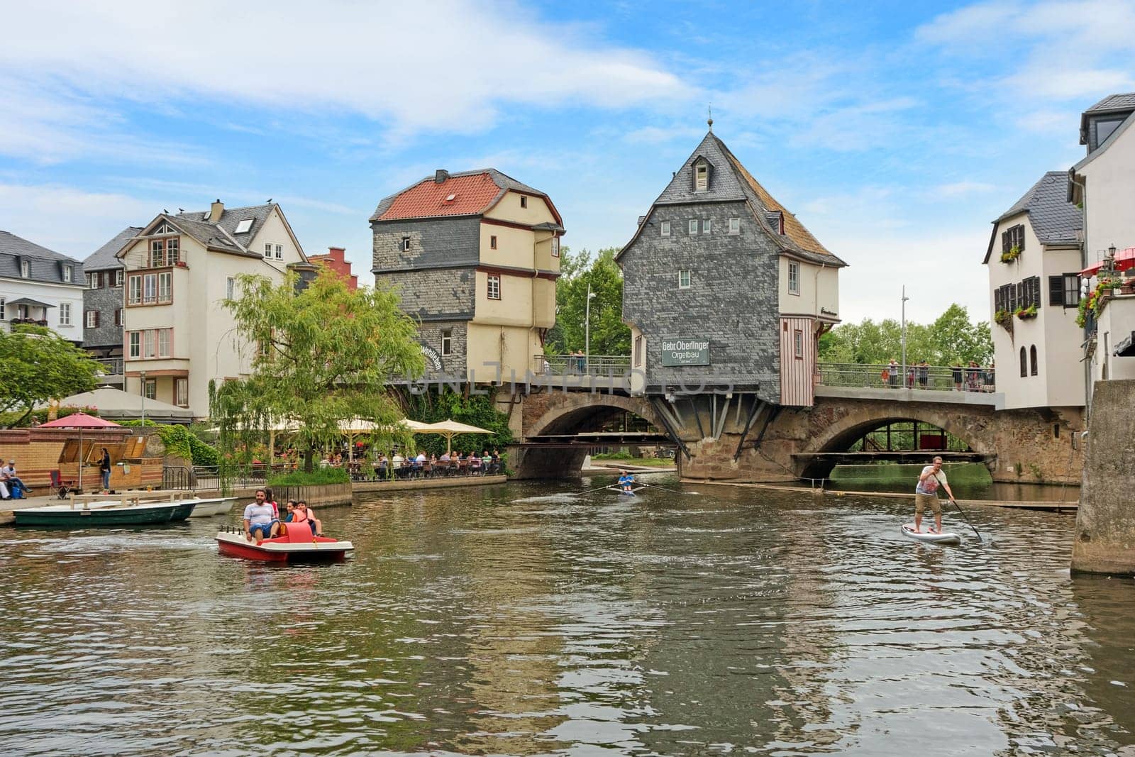 Bad Kreuznach, Germany - June 17, 2017: Inner city of Bad Kreuznach, river Nahe with old, famous buildings and bridge