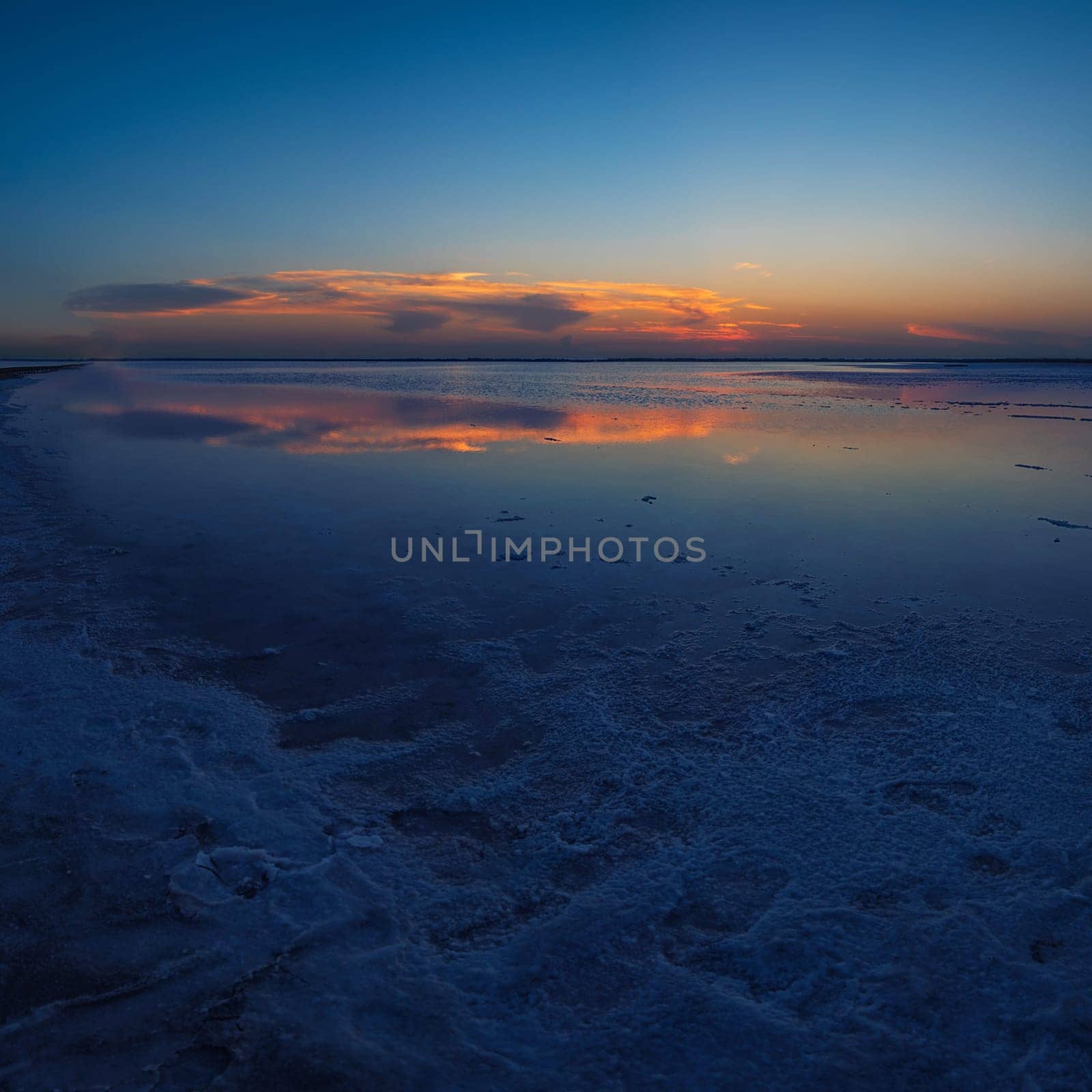 Beauty sunset on salty lake in Altay, Siberia, Russia
