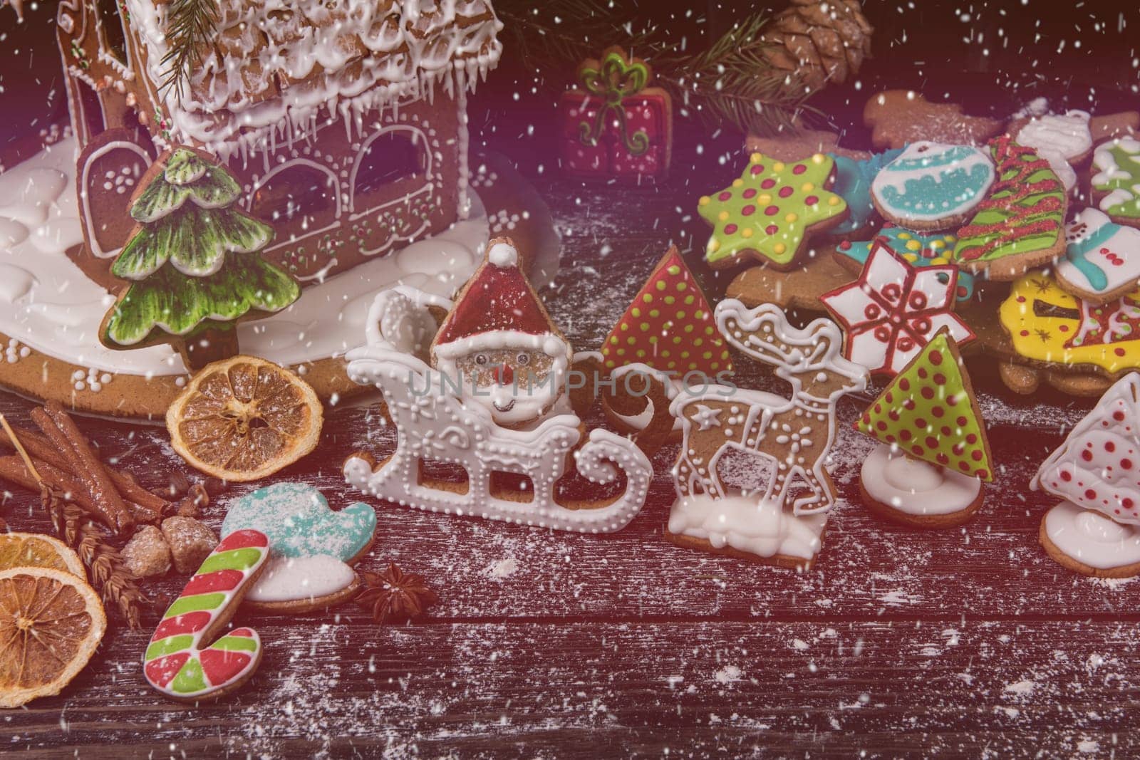 Gingerbreads for new years and christmas on wooden background, xmas theme