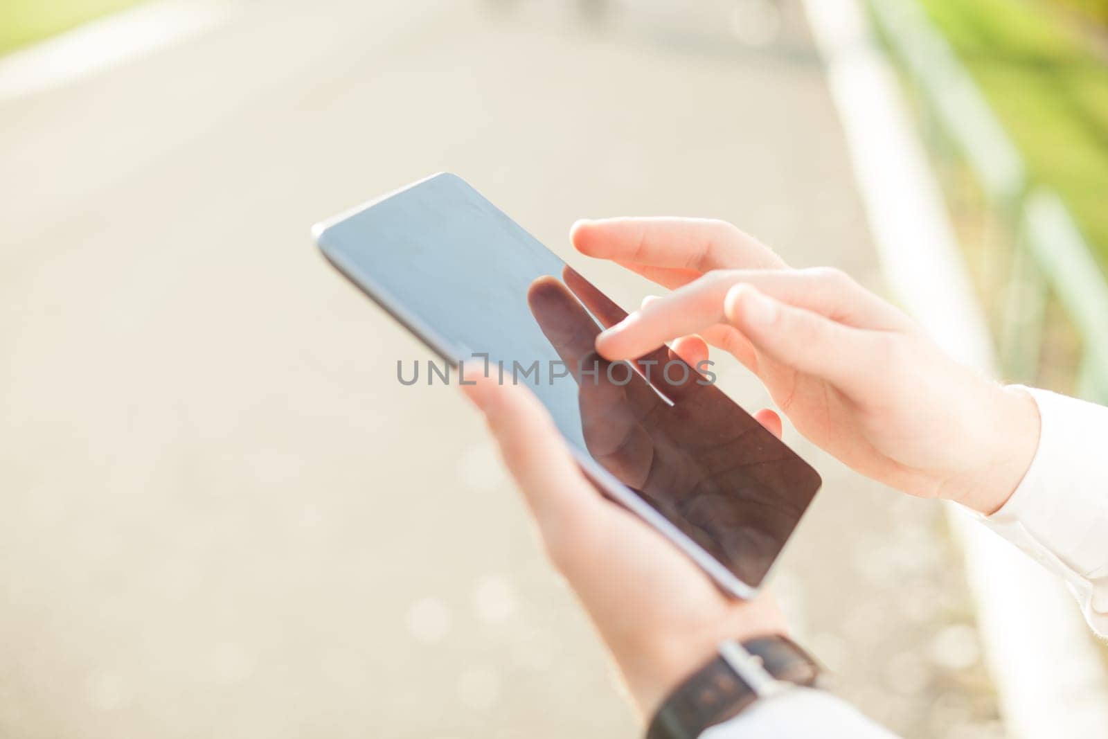 Close up of man hands using touchscreen on digital tablet