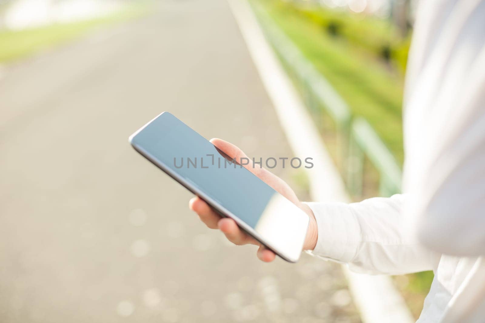 Close up of man hands using touchscreen on digital tablet