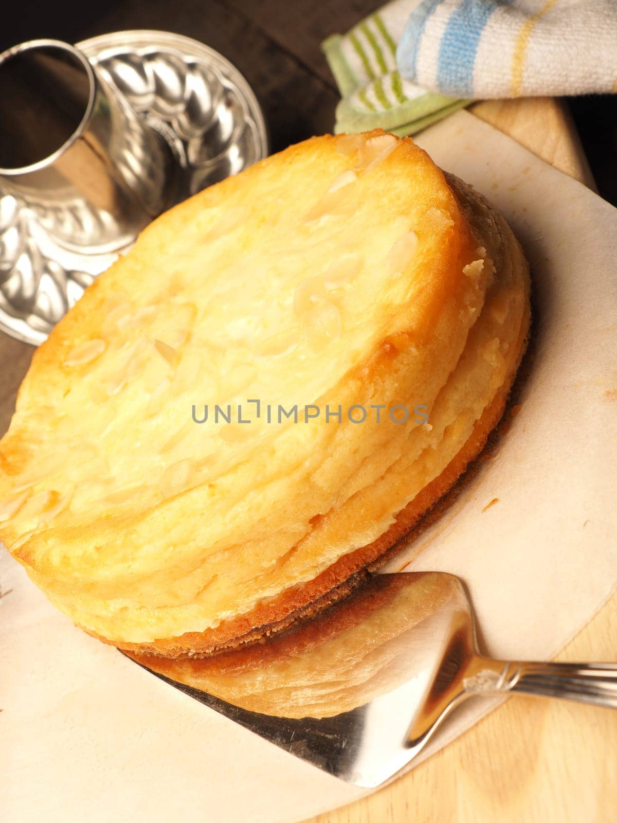 Tasty cheesecake in a kitchen, homemade food and bakery