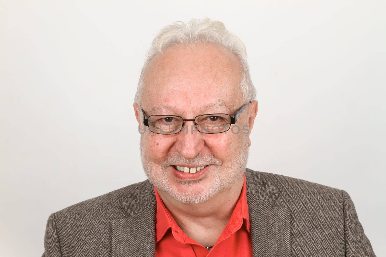 Smiling senior exposed on white background