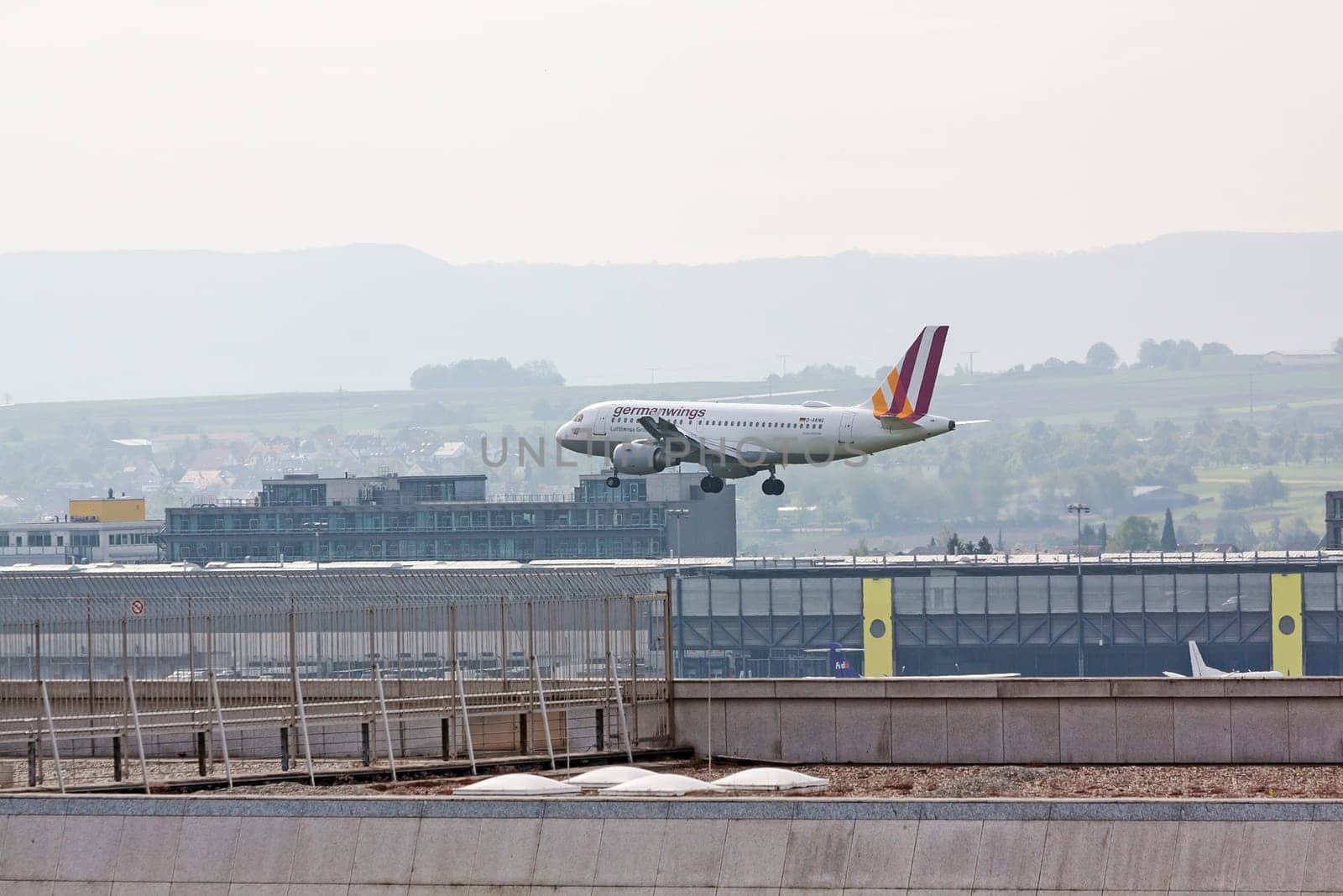 Stuttgart, Germany - May 06, 2017: Germanwings Airbus A319 airplane during landing at airport Stuttgart, Germany