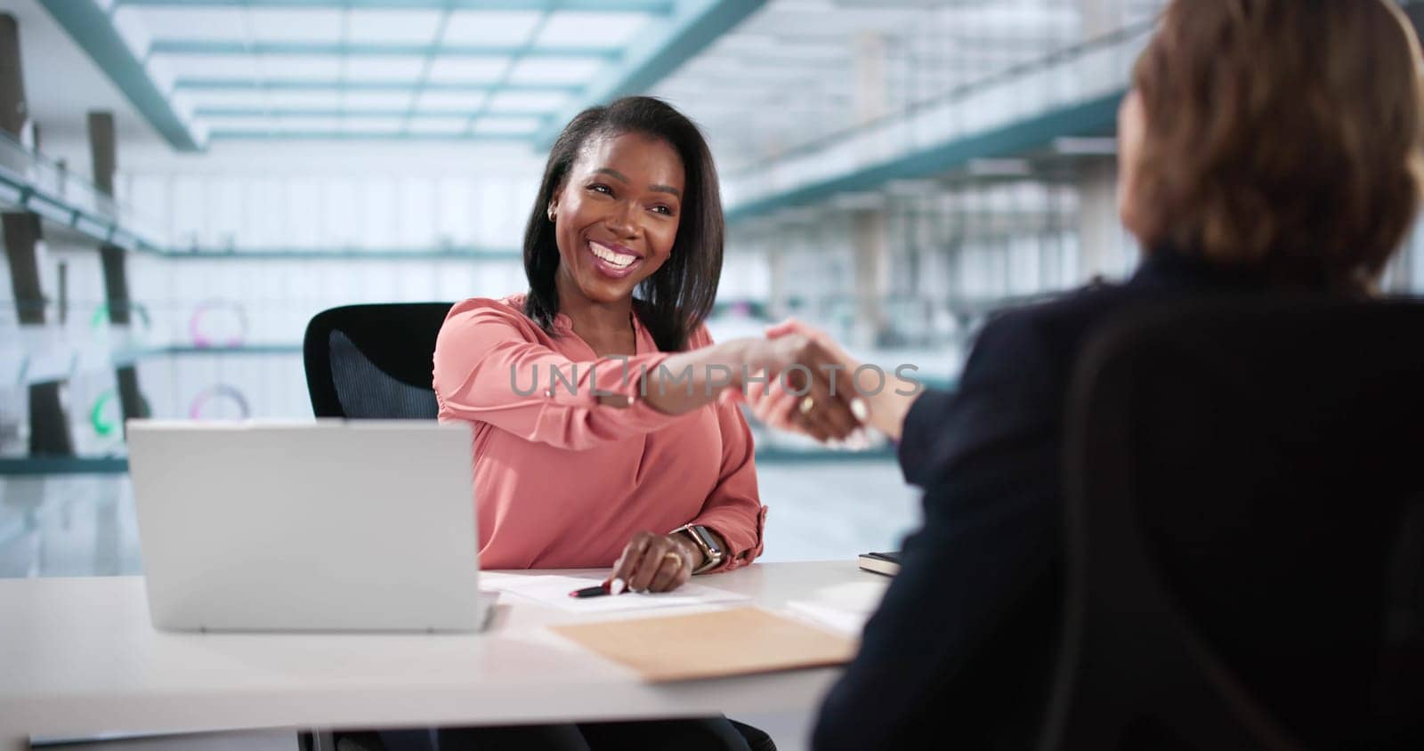 Law Recruiter Meeting Handshake - African American woman in office.