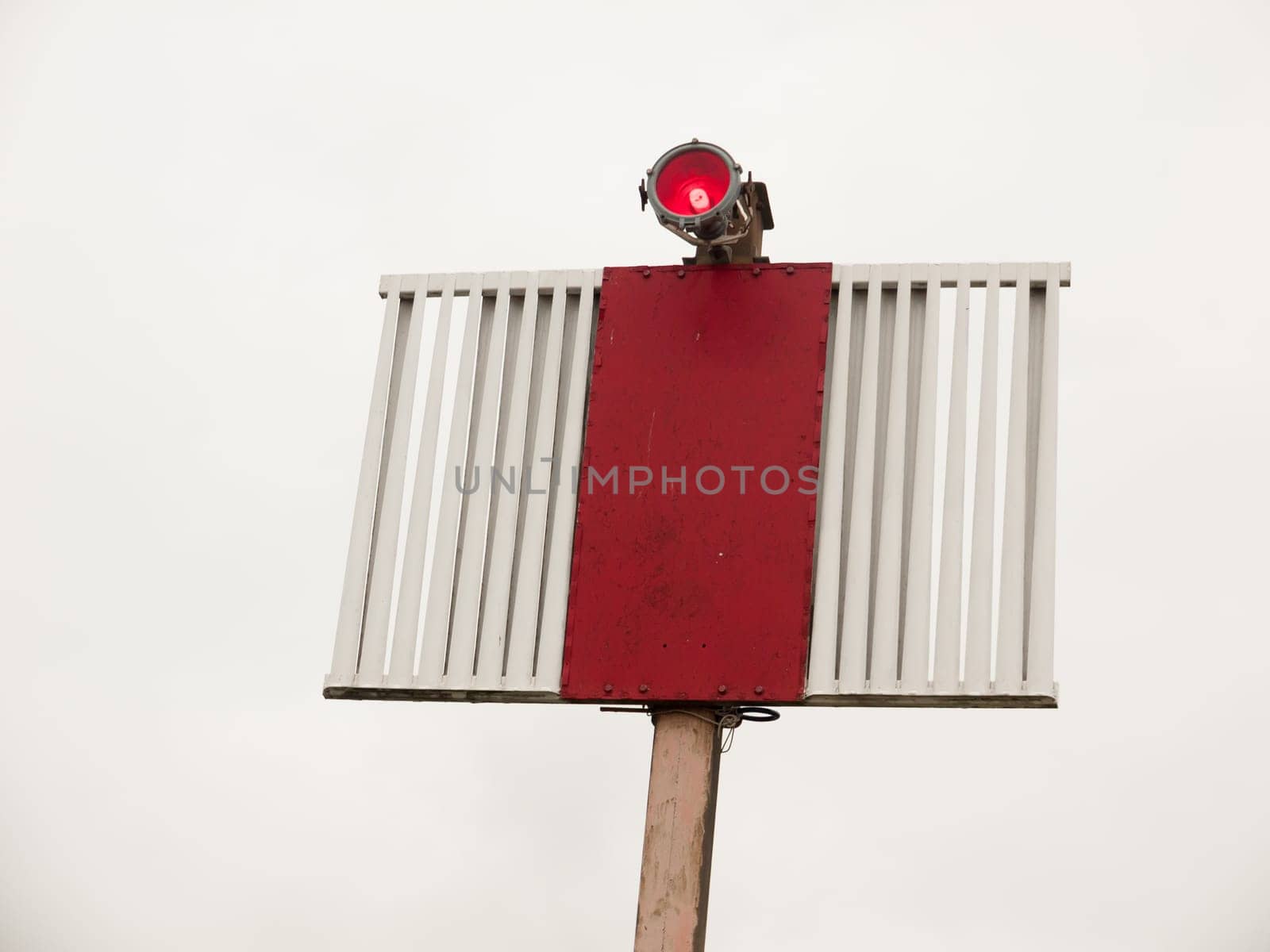 a marine seaside red and white light metal thing in sky  England  UK