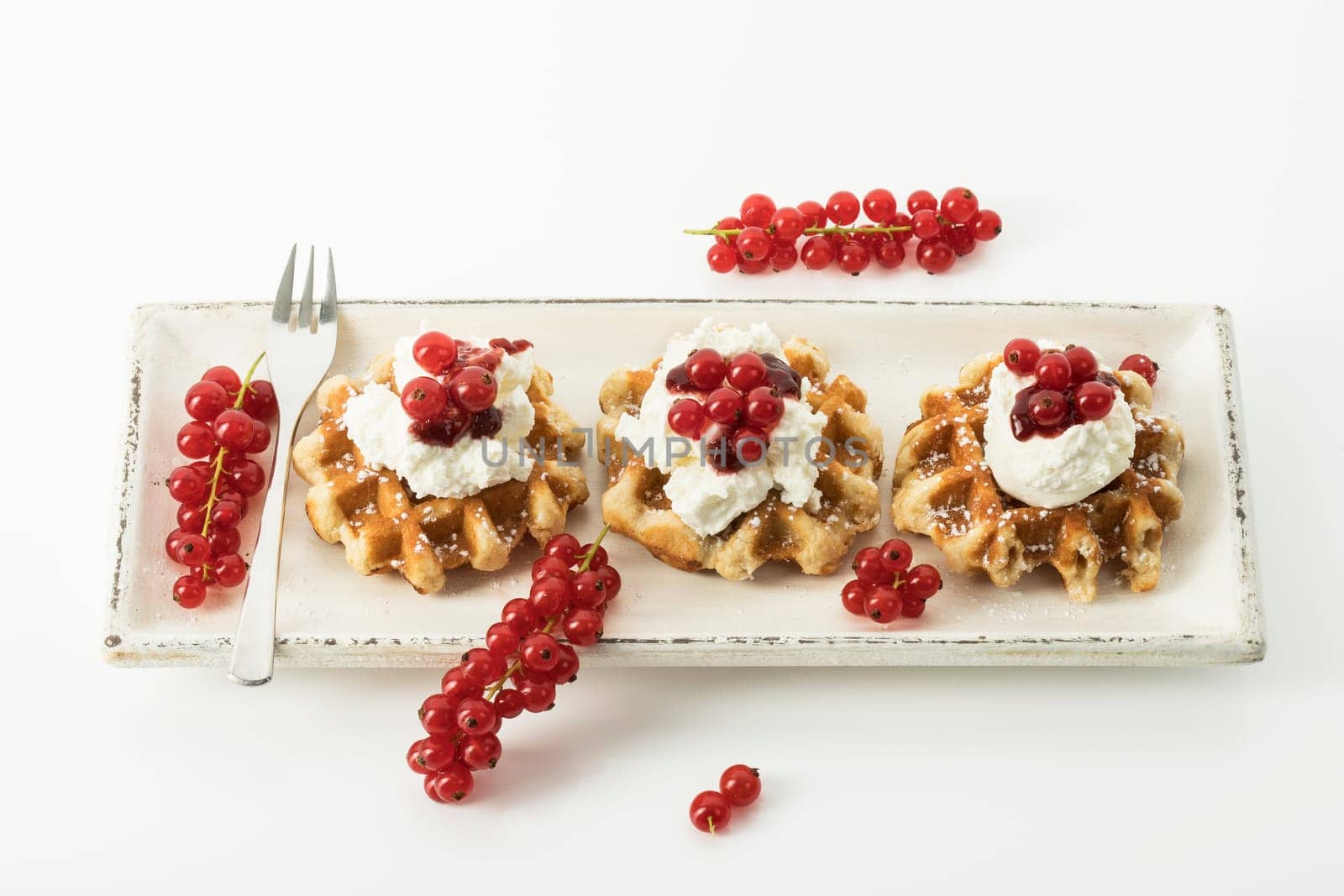 Waffles with currants and cottage cheese