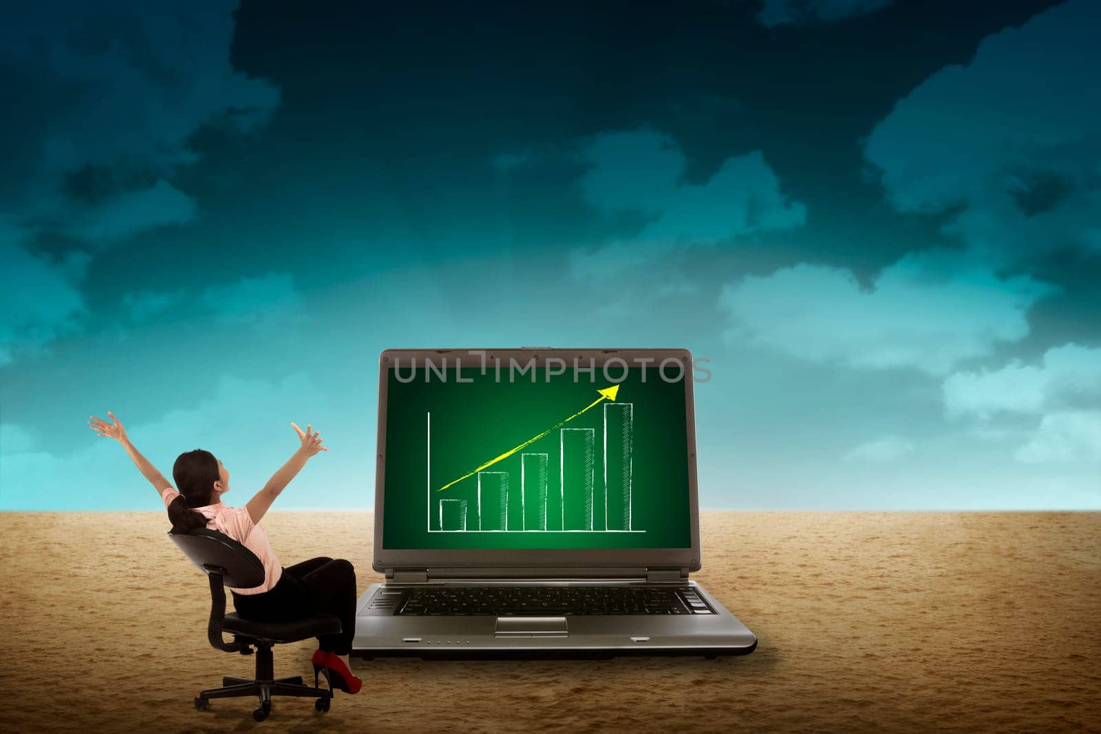 Business person looking giant laptop on the desert. Wireless concept