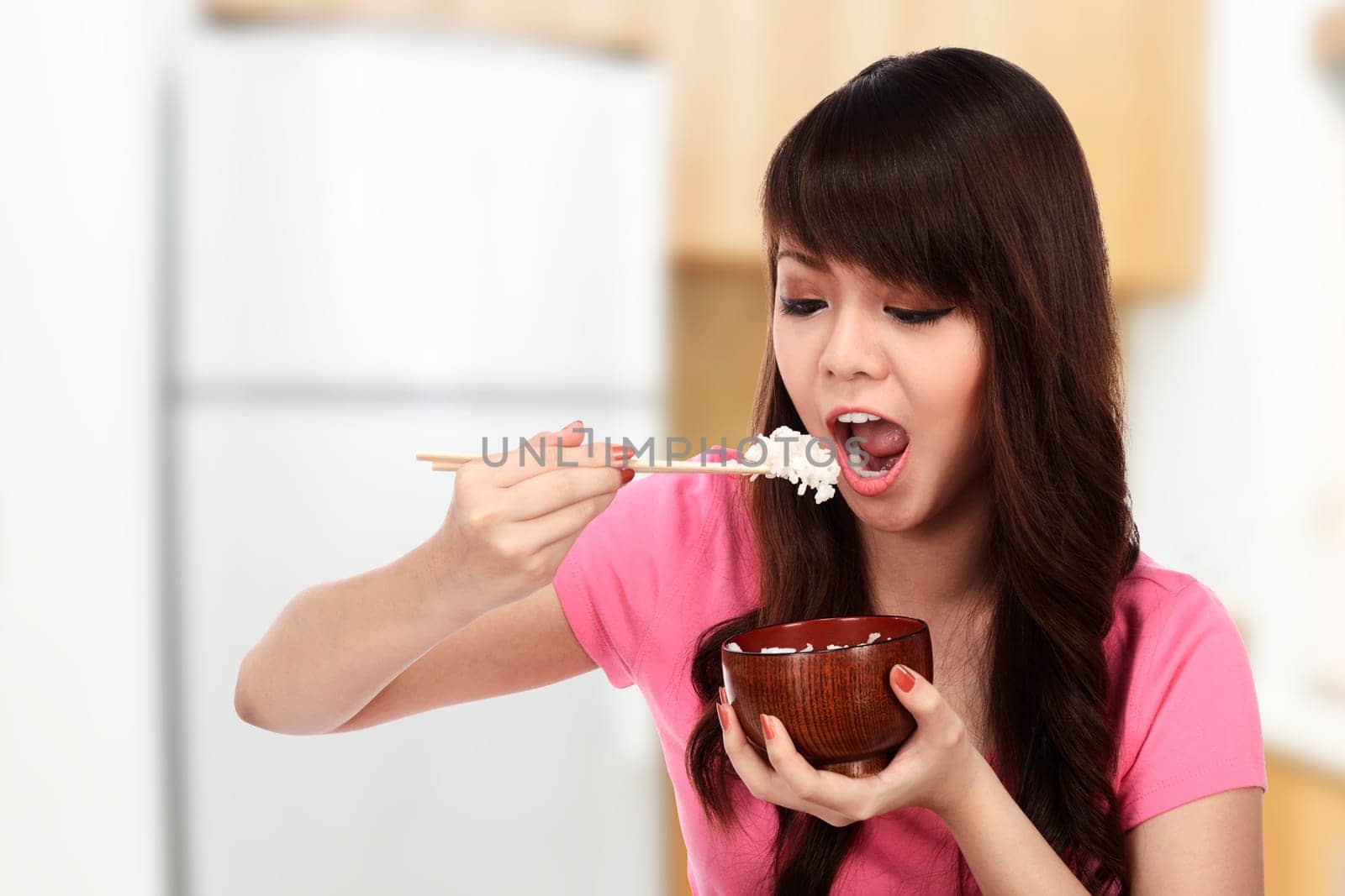 Asian pretty woman eating japanese food. Eat concept