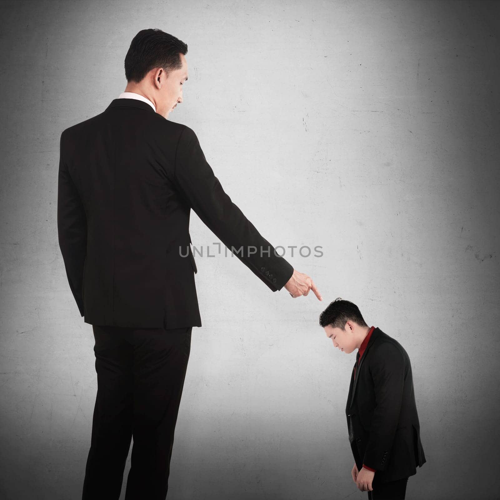 Concept of accused businessman with fingers pointing