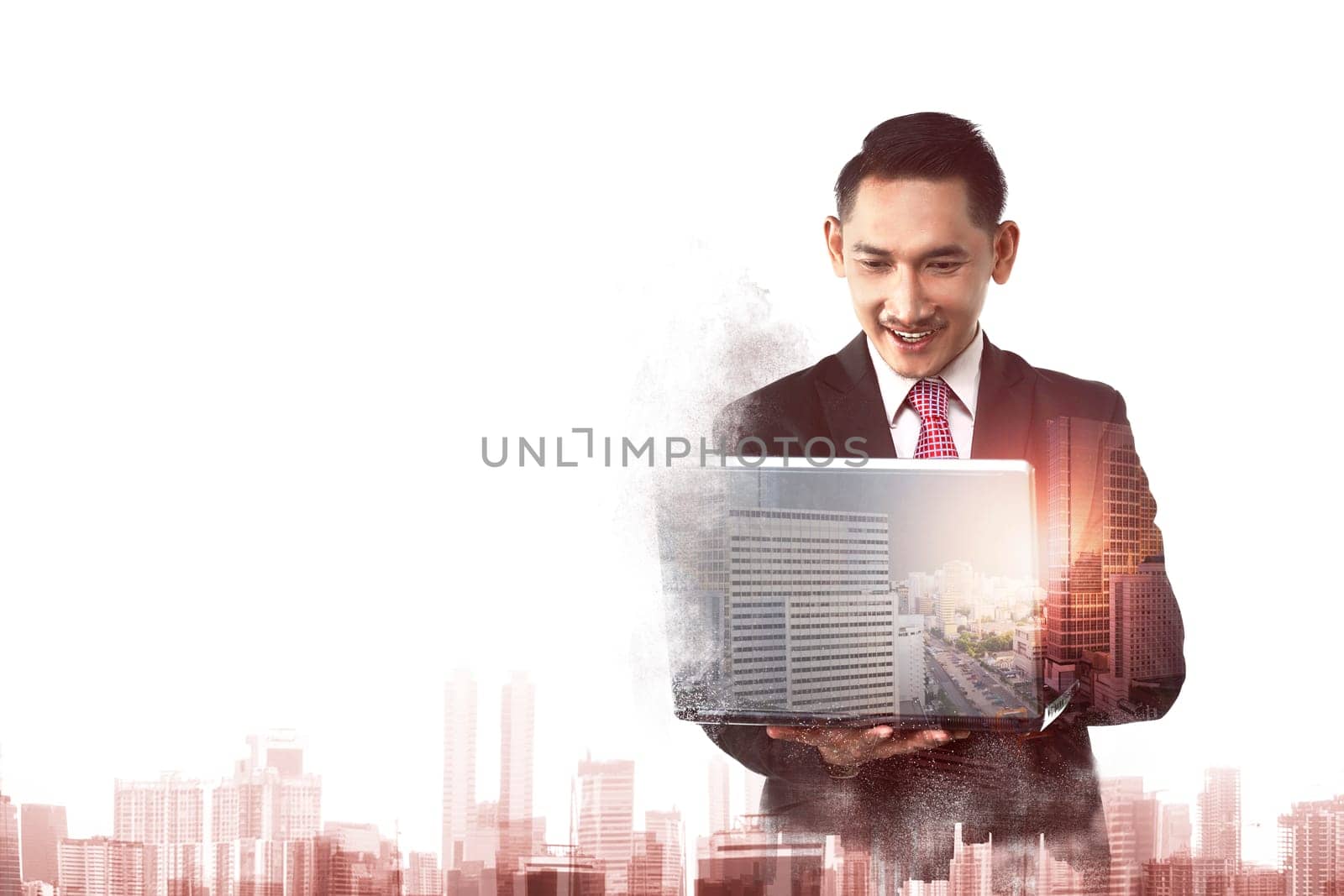 Double exposure of asian business man typing with laptop combined with building