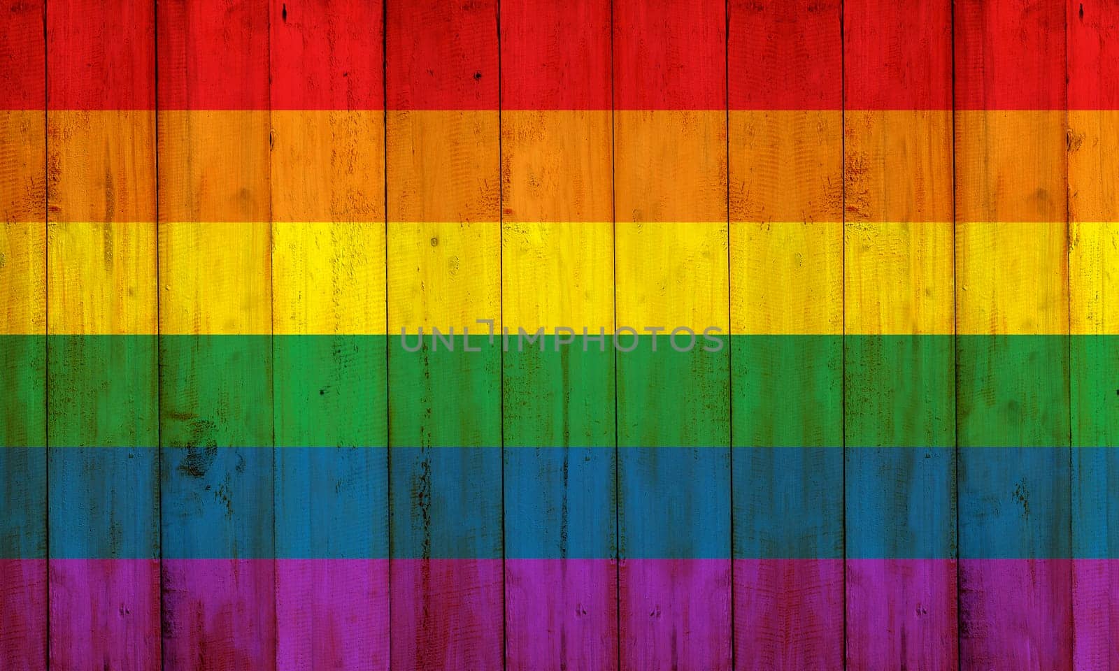 Gay flag rainbow on wooden fence texture. LGBT Concept