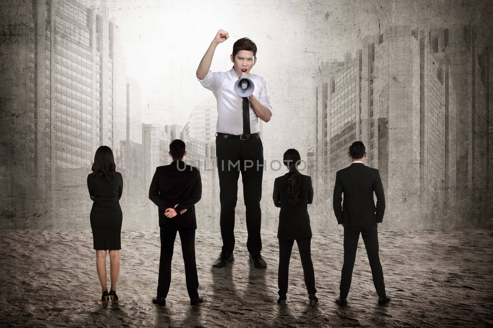 Business leader command his subordinate using megaphone. Business leadership concept